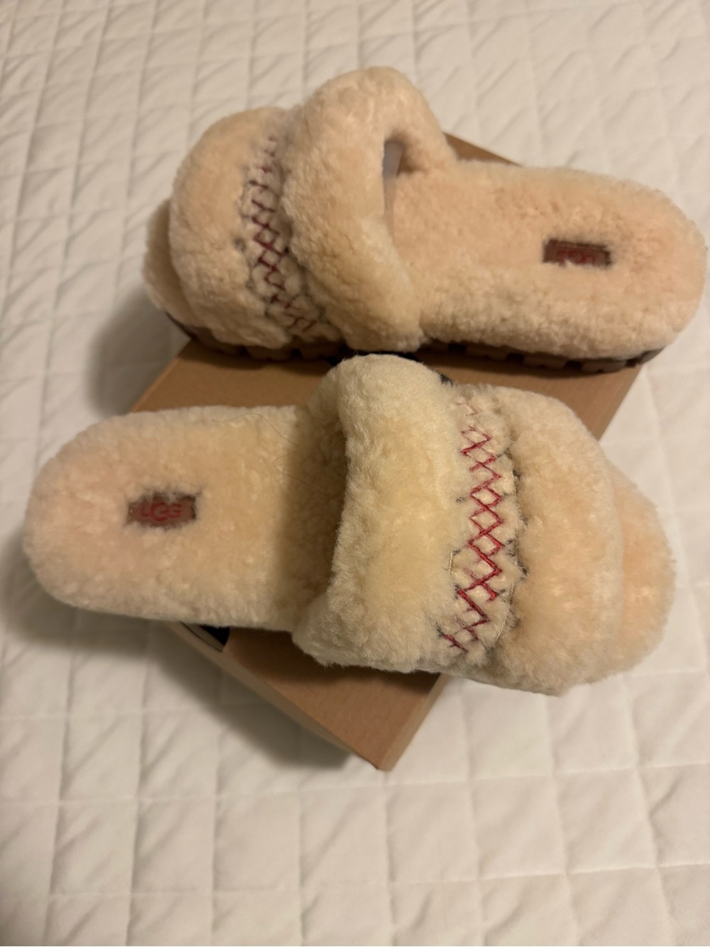 UGG Cream Faux Shearling Slide Slippers with Red Stitching